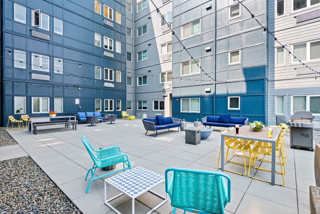 a large courtyard with outdoor furniture